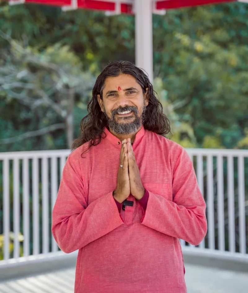 Yogi Vishnu Panigrahi, founder of World Peace Yoga School, greeting with Namaste