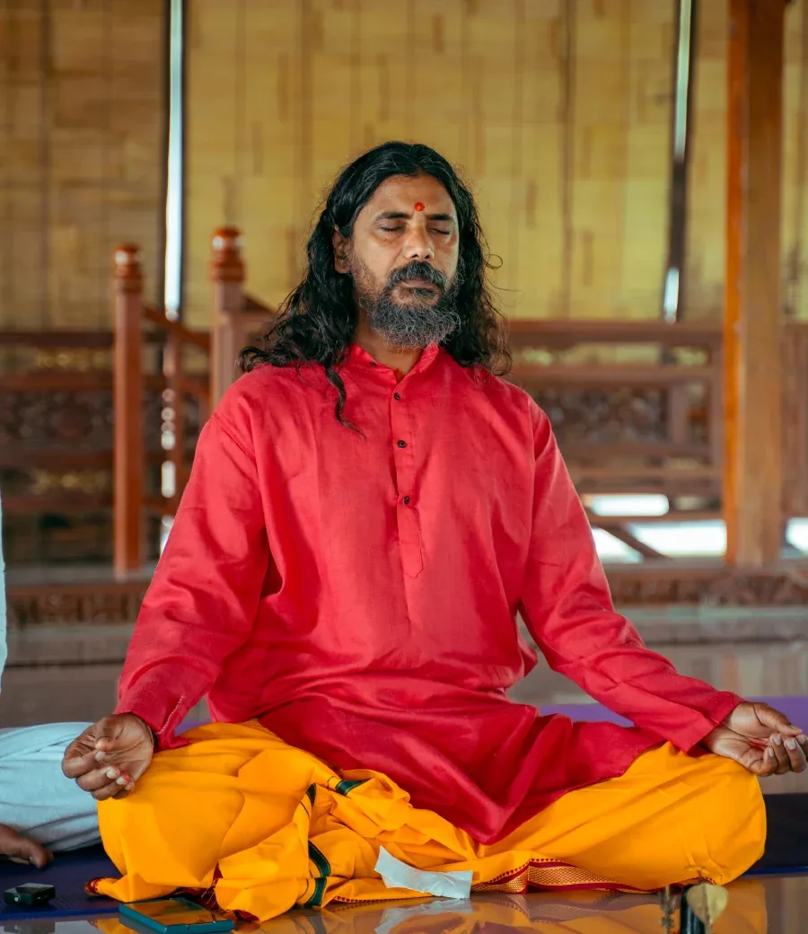 Yogi Vishnu Panigrahi, founder of World Peace Yoga School, meditating in lotus pose