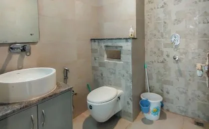 Modern tiled bathroom with a vessel basin