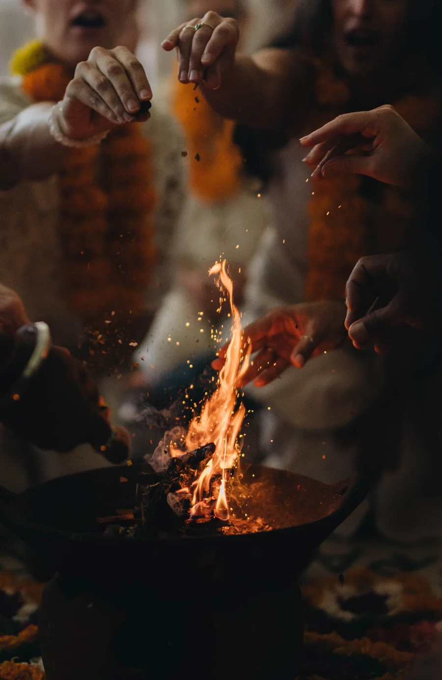 Students offering to the sacred fire during a havan