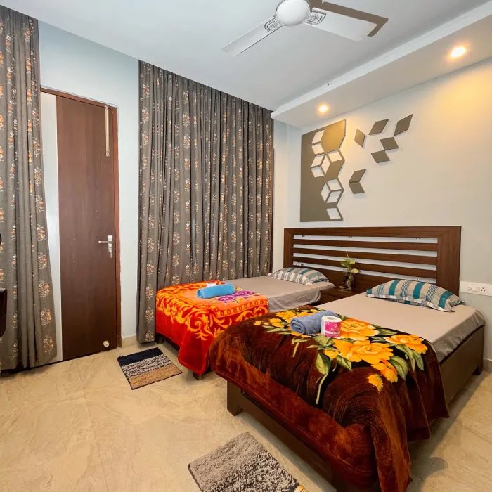 A student room at World Peace Yoga School, Rishikesh