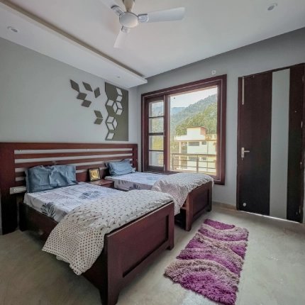 A student room at World Peace Yoga School, Rishikesh