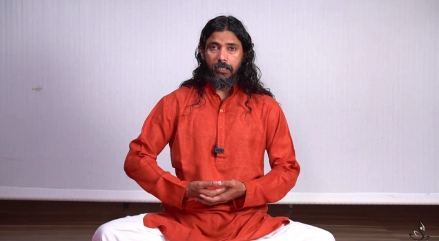 Yogi Vishnu seated in meditation during an online Kundalini class