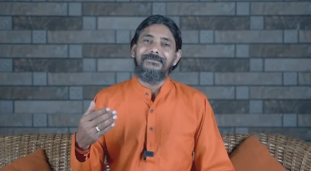 A teacher speaking in an online prenatal yoga lecture