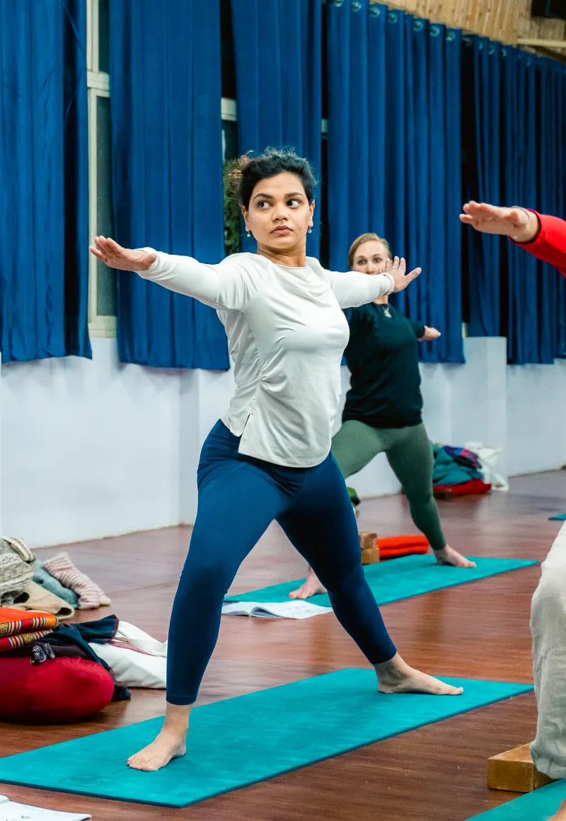 Students in a supported Yin Yoga pose
