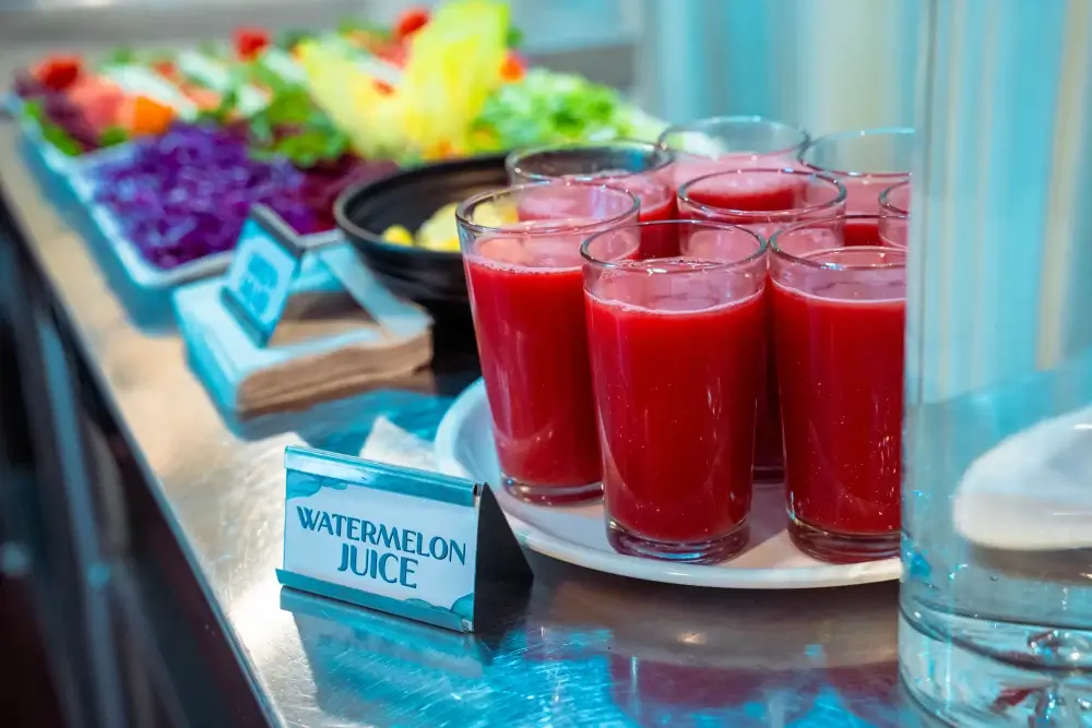 Glasses of fresh watermelon juice on the buffet counter