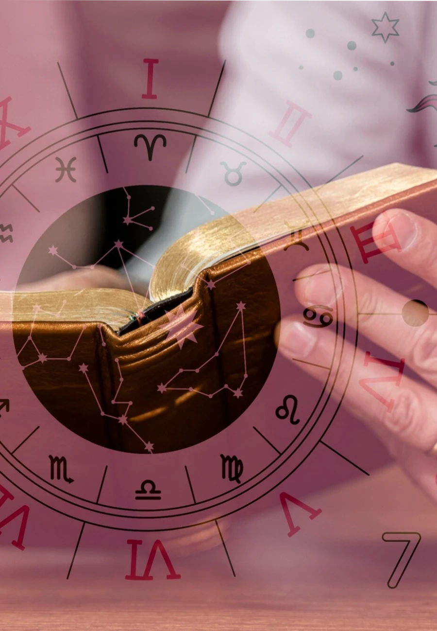 Hands holding an open book overlaid with a zodiac chart